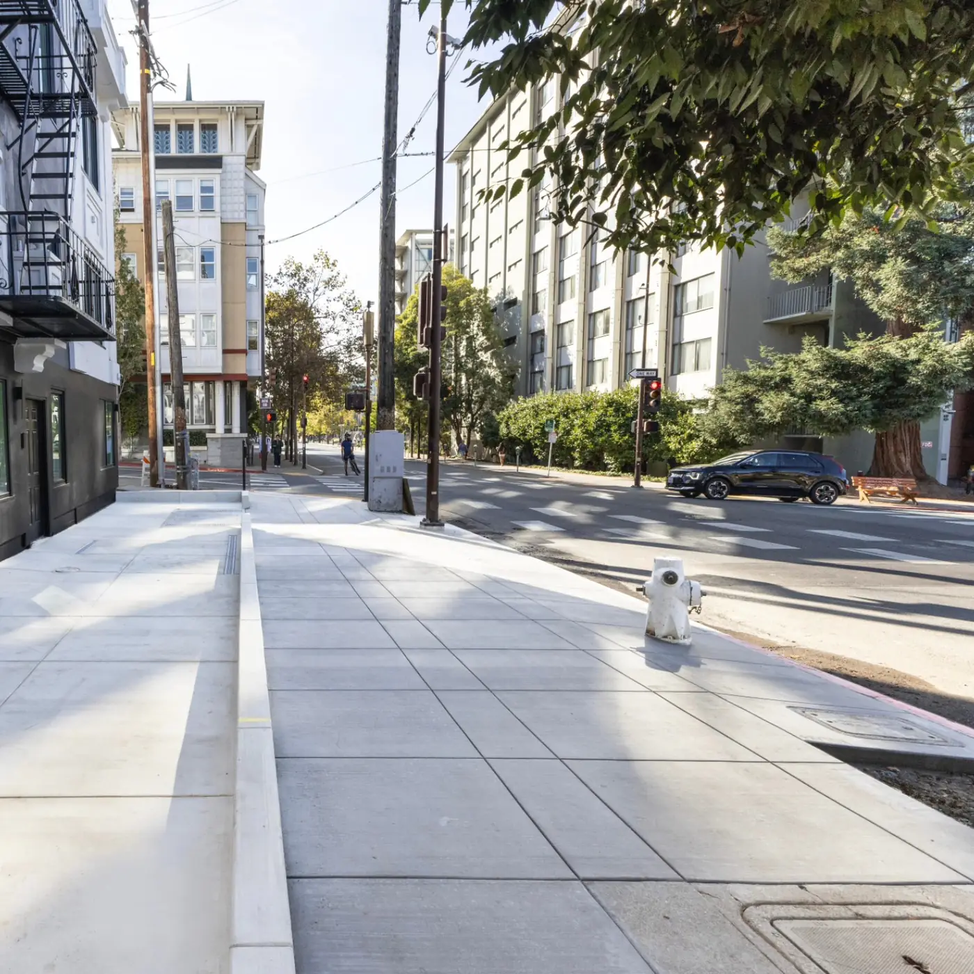 Long perspective completed sidewalk, curb + gutter — Durant Sidewalk — UC Berkeley, Berkeley, CA