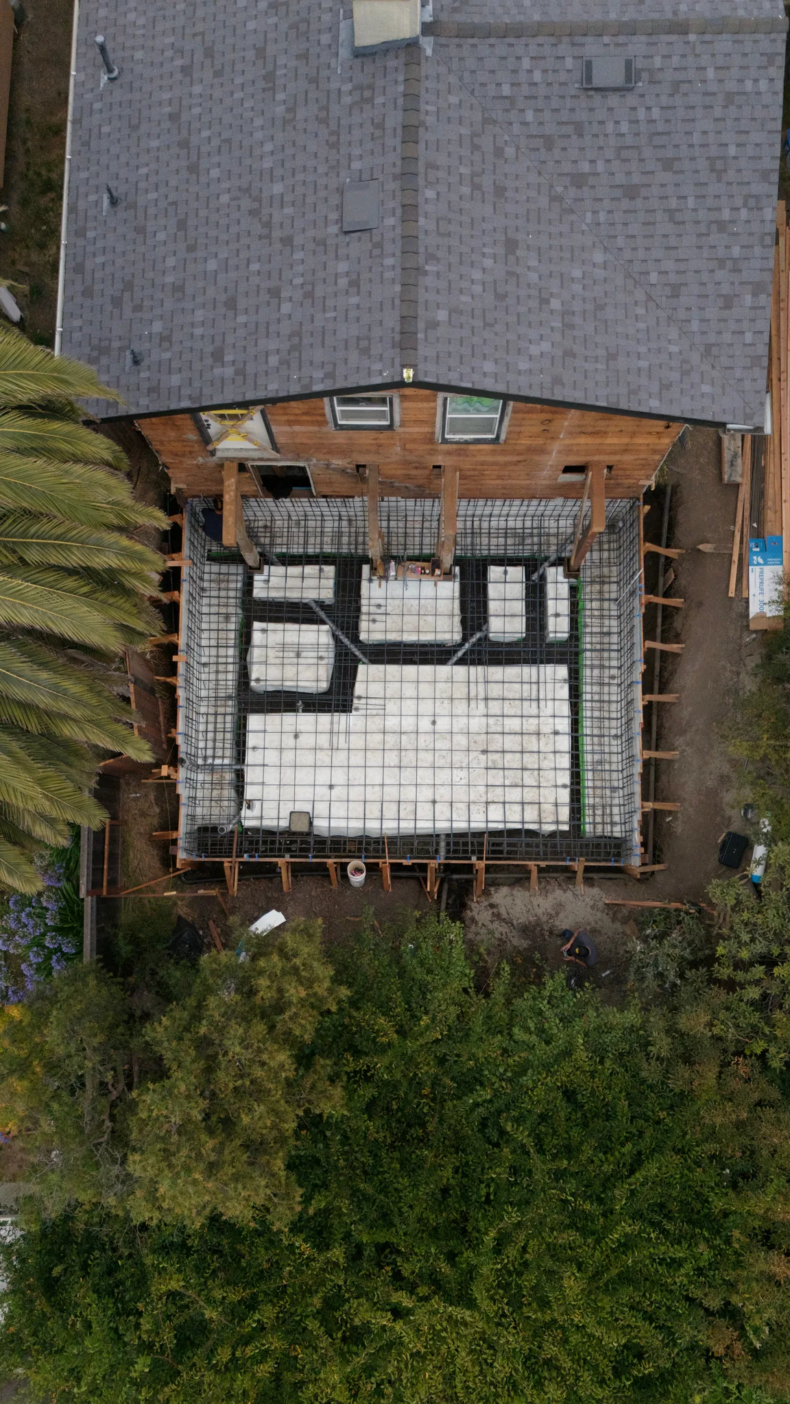 Top-down view of the formed foundation — void forms and slab steel filling the addition footprint — Albany Home Addition Foundation, Albany, CA