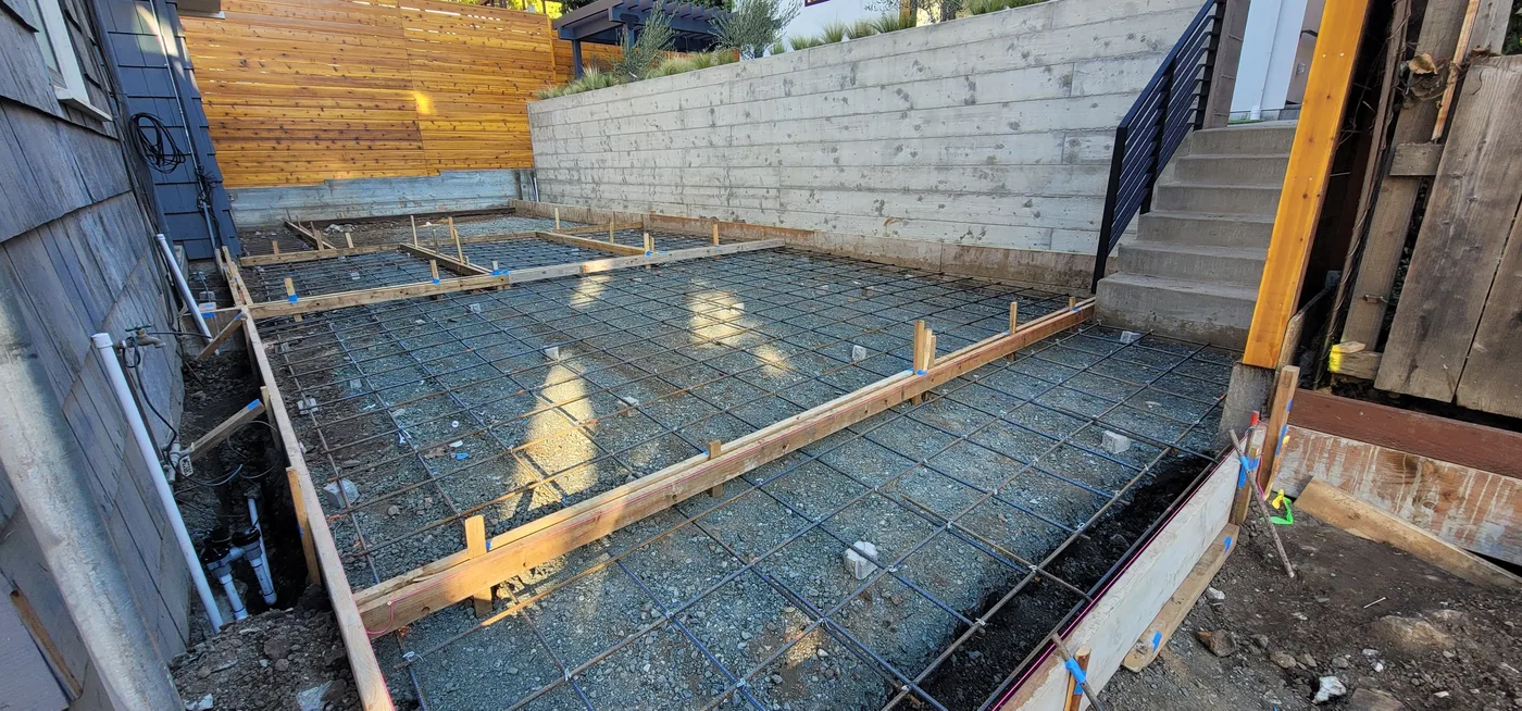 Concrete flatwork formed against the retaining wall — Berkeley Student Housing Foundation, Berkeley, CA
