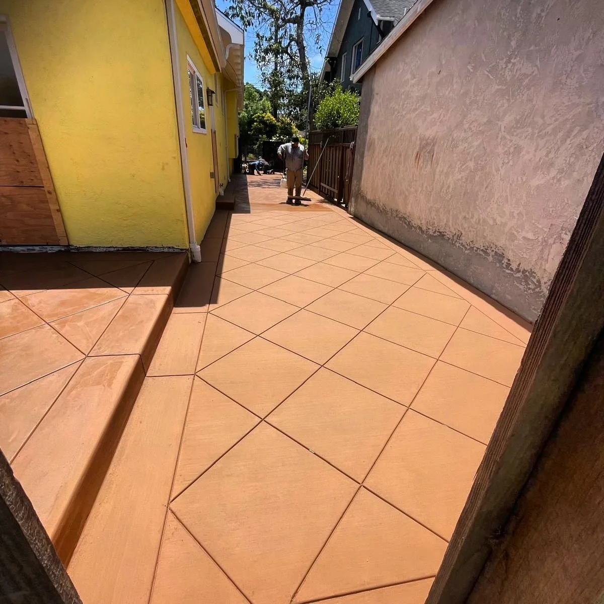 The same sealed decorative finish carried onto the side patio